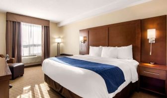 Bright and spacious day use room with work desk at Quality Inn Hotel Medicine Hat.