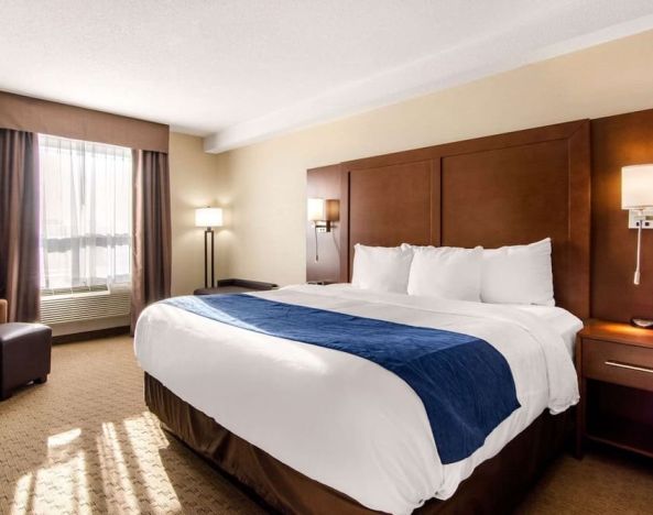 Bright and spacious day use room with work desk at Quality Inn Hotel Medicine Hat.