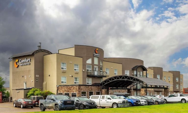 Hotel exterior and parking area at Quality Inn Hotel Medicine Hat.