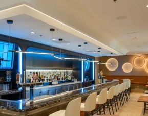 Stylish hotel bar with lounge area at Atlantica Hotel Halifax.