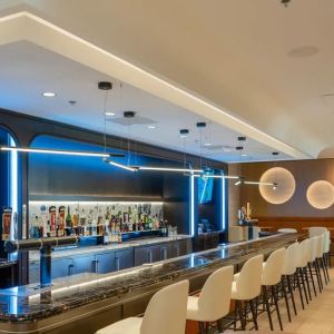 Stylish hotel bar with lounge area at Atlantica Hotel Halifax.