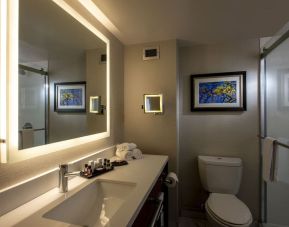 Guest bathroom with shower and free toiletries at Atlantica Hotel Halifax.