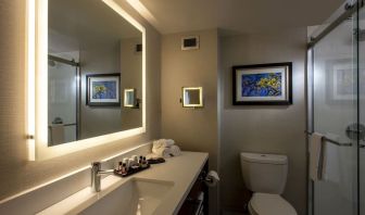 Guest bathroom with shower and free toiletries at Atlantica Hotel Halifax.