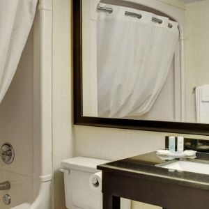 Guest bathroom with tub and free toiletries at Comfort Inn Pembroke.