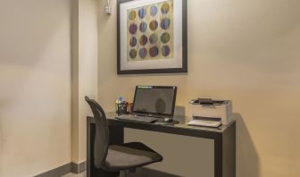 Business center with computer, printer and ergonomic chair at Comfort Inn Belleville.