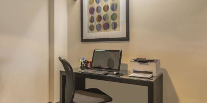 Business center with computer, printer and ergonomic chair at Comfort Inn Belleville.