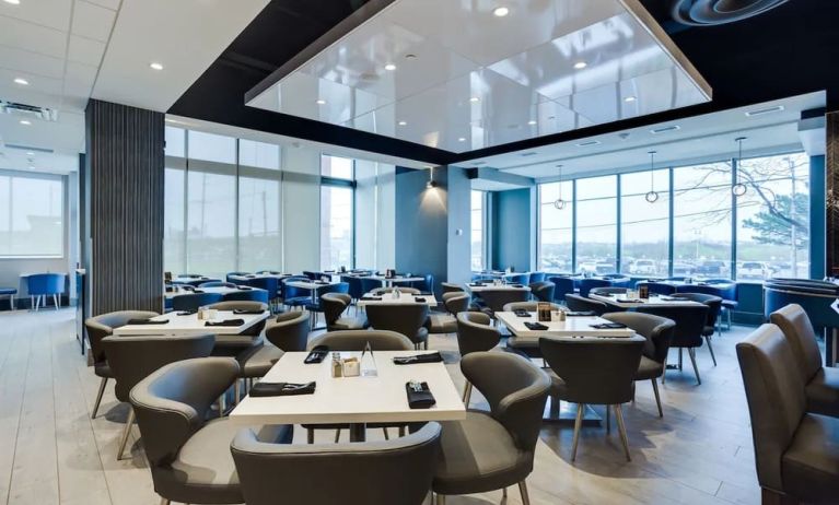 Stylish dining area at Embassy Suites By Hilton Toronto Airport.