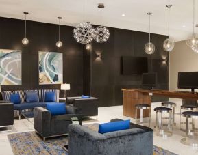 Business center and lounge area at Embassy Suites By Hilton Toronto Airport.