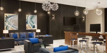 Business center and lounge area at Embassy Suites By Hilton Toronto Airport.