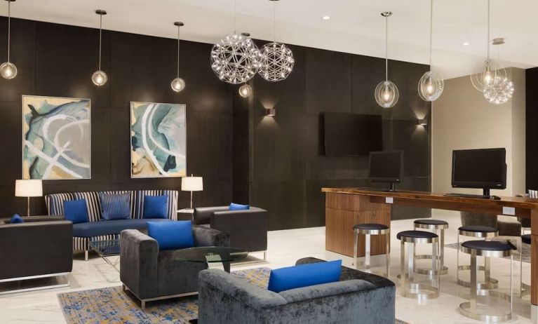 Business center and lounge area at Embassy Suites By Hilton Toronto Airport.