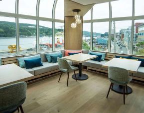 Dining area with beautiful view at DoubleTree By Hilton St. John's Harbourview.