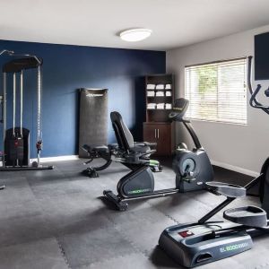 Fitness center available at Garner By IHG.