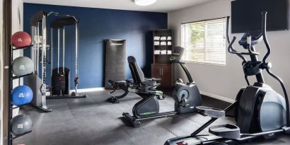 Fitness center available at Garner By IHG.