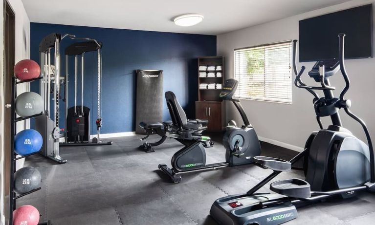 Fitness center available at Garner By IHG.