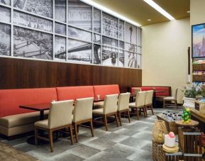 Dining area perfect for coworking at Hilton Garden Inn New York/West 35th Street.