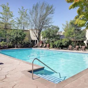 Refreshing outdoor pool at Hilton Seattle Airport & Conference Center.