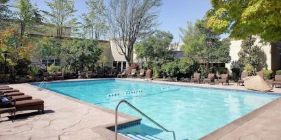 Refreshing outdoor pool at Hilton Seattle Airport & Conference Center.