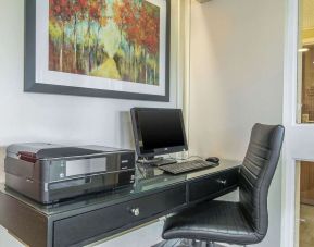 Business center with computer, printer and ergonomic chair at Comfort Inn Moncton Magnetic Hill.