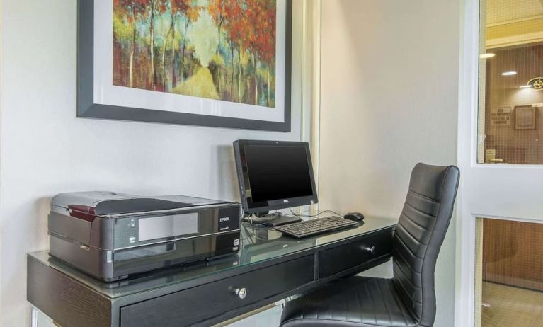 Business center with computer, printer and ergonomic chair at Comfort Inn Moncton Magnetic Hill.