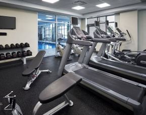 Fully equipped fitness center at Holiday Inn & Suites Oakville At Bronte.