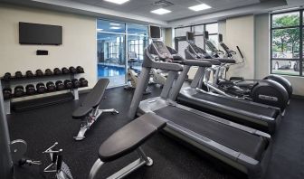 Fully equipped fitness center at Holiday Inn & Suites Oakville At Bronte.