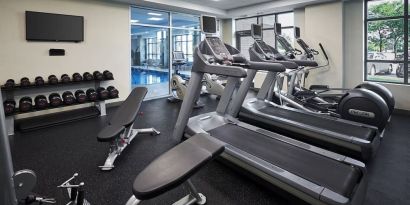 Fully equipped fitness center at Holiday Inn & Suites Oakville At Bronte.