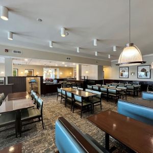 Dining area with comfortable seating at Holiday Inn Toronto Airport East.