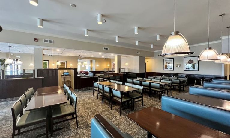 Dining area with comfortable seating at Holiday Inn Toronto Airport East.