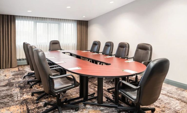 Professional meeting room with ergonomic chairs at Holiday Inn Toronto Airport East.