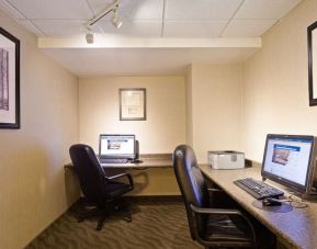 Business center with computers, printer and ergonomic chair at Best Western North Bay.