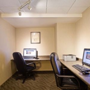 Business center with computers, printer and ergonomic chair at Best Western North Bay.