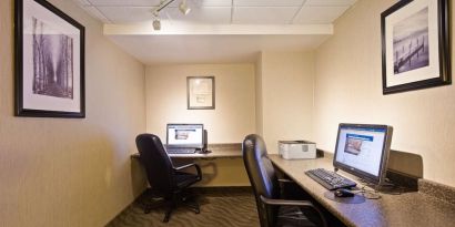 Business center with computers, printer and ergonomic chair at Best Western North Bay.