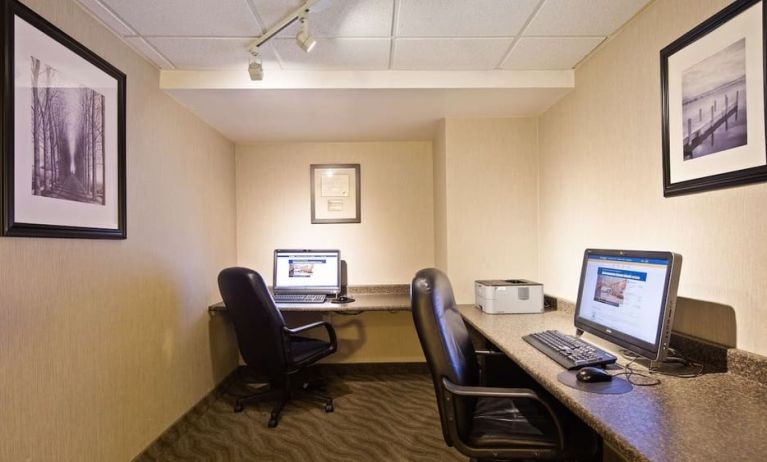 Business center with computers, printer and ergonomic chair at Best Western North Bay.