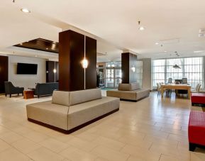 Lobby lounge area and workspace perfect for co-working at Holiday Inn Ottawa Downtown Parliament Hill.