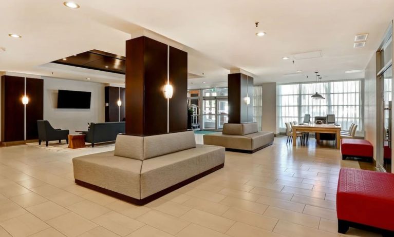 Lobby lounge area and workspace perfect for co-working at Holiday Inn Ottawa Downtown Parliament Hill.