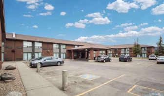 Hotel exterior and parking area at Comfort Inn Edmonton West.