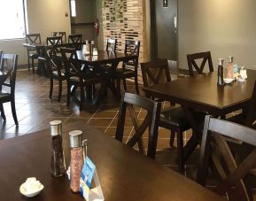 Dining area with comfortable seating at Comfort Inn Edmonton West.