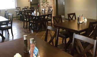 Dining area with comfortable seating at Comfort Inn Edmonton West.