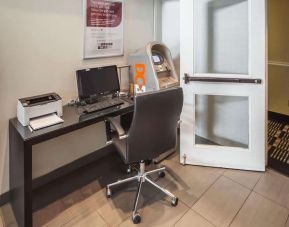 Business center with computer, printer, ergonomic chair and ATM at Comfort Inn Edmonton West.