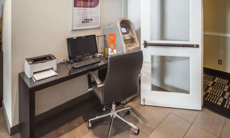 Business center with computer, printer, ergonomic chair and ATM at Comfort Inn Edmonton West.