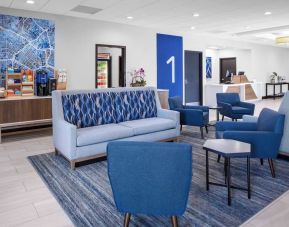 Lobby and coworking lounge at Holiday Inn Express & Suites Hermosa Beach.