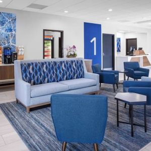 Lobby and coworking lounge at Holiday Inn Express & Suites Hermosa Beach.