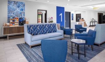 Lobby and coworking lounge at Holiday Inn Express & Suites Hermosa Beach.