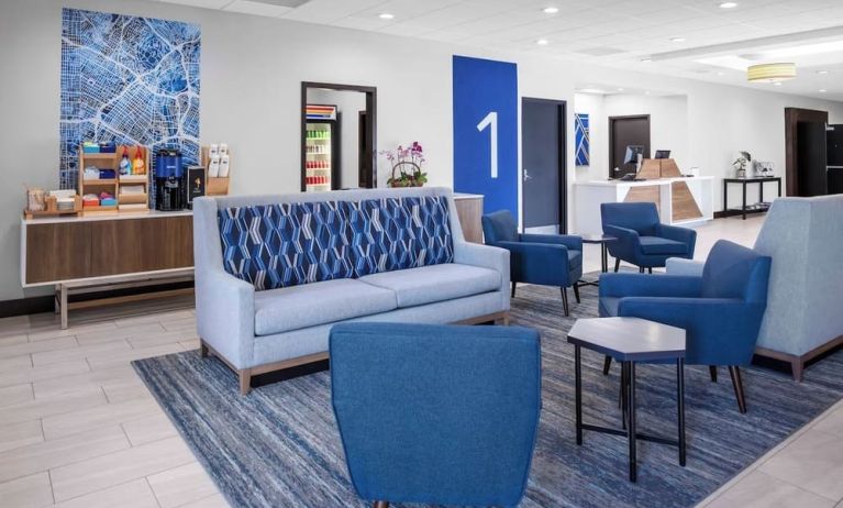 Lobby and coworking lounge at Holiday Inn Express & Suites Hermosa Beach.