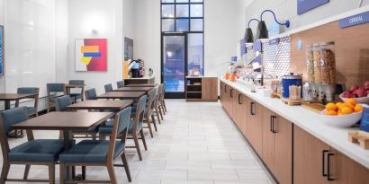 Dining area perfect for coworking at Holiday Inn Express & Suites Hermosa Beach.