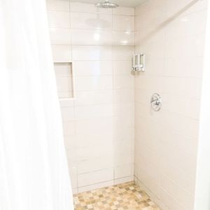 Guest bathroom with shower at Hotel Current.