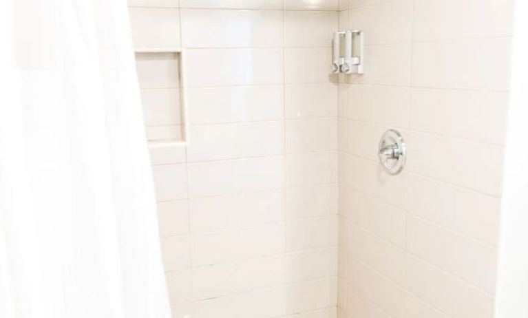 Guest bathroom with shower at Hotel Current.