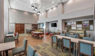 Dining area perfect for coworking at Hampton Inn & Suites Dallas/Allen.