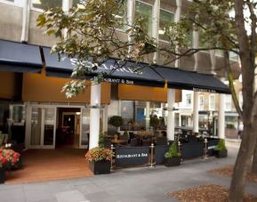 Hotel restaurant with outdoor sitting at Thistle Royal Trafalgar Square.