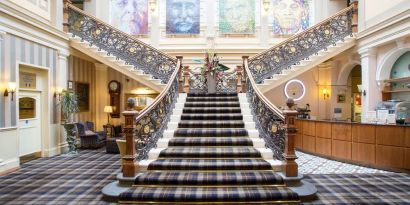 Hotel lobby with double staircase at The Royal Highland Hotel.